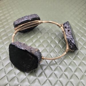 954. Bourbon and Bowties Gold Tone Wire Bracelet with Black Raw Stone Accents